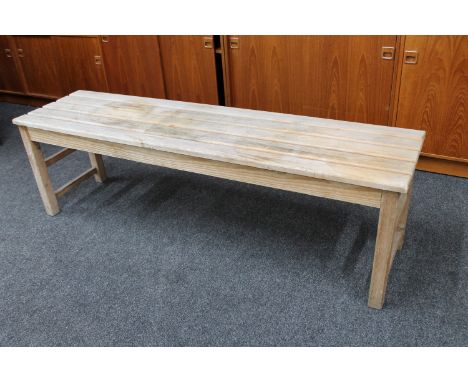 A pine slatted bench 