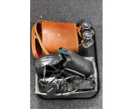 A tray of Vespa binoculars, Olympus camera, lens etc 