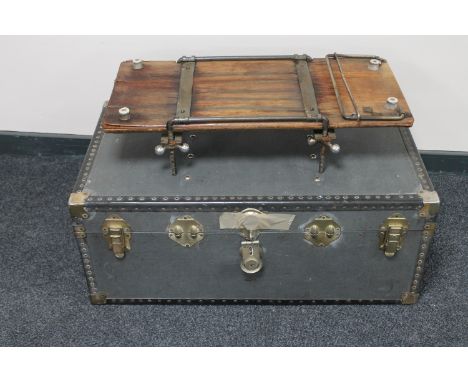 A metal bound trunk together with an antique National automatic trouser press 