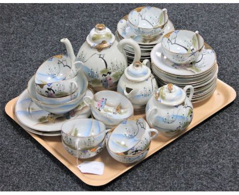 A tray of Japanese egg shell tea service 