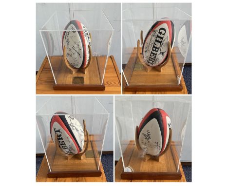 England Rugby Union 2003 World Cup winners multi signed Gilbert Rugby ball displayed on purpose built stand in Perspex case i