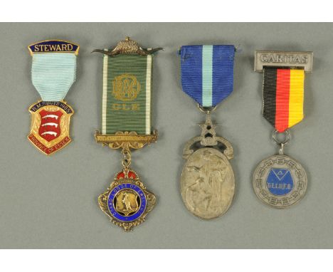 A silver and enamel RAOB medal, and three other medals. 