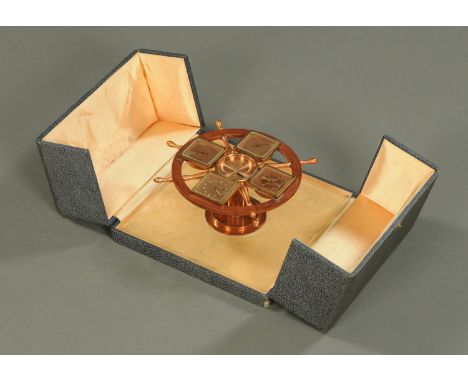 A ships wheel desk top combined clock barometer thermometer compass and hygrometer set, cased.  Width 19 cm.    CONDITION REP