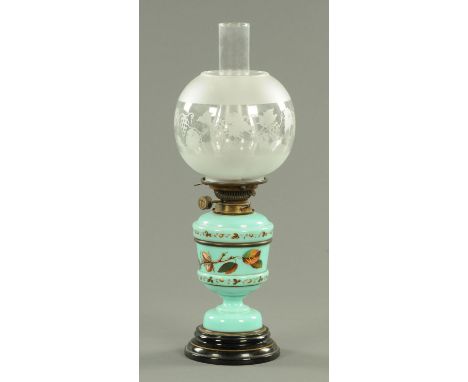 A Victorian opaline glass oil lamp with shade. 