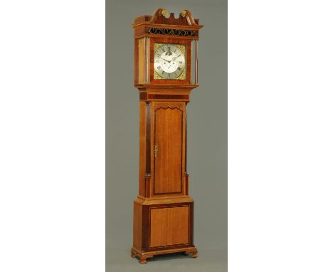 A George III oak and mahogany crossbanded longcase clock, the eight day striking movement by Lawson of Newton, with brass dia