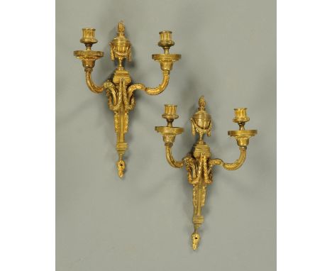 A pair of Adam style gilt metal light brackets.  Height 39 cm.    CONDITION REPORT:  Both brackets are in good condition with