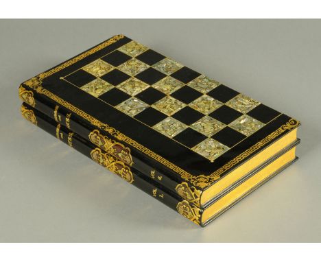 A black lacquer and mother of pearl book form backgammon board.  Height 44 cm.    CONDITION REPORT:  The games board is n gen