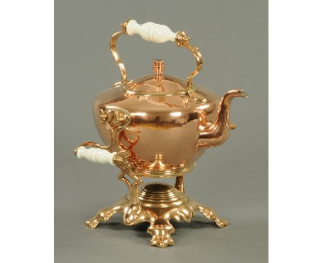 A Victorian copper kettle, on spirit stand.  Height 36 cm.   CONDITION REPORT:  There is a loss to the underside front edge o