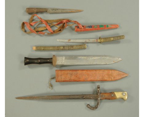 A miniature Japanese sword, with wire bound grip and scabbard, length 33 cm, a Native American Indian dagger, a French bayone