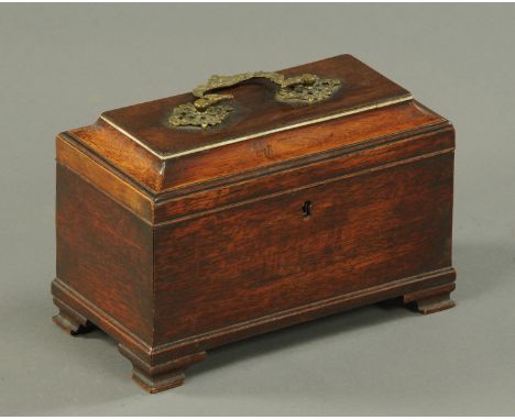 A George III tea caddy, with original Rococo handle.    CONDITION REPORT:  The interior of the caddy has one single lid acros