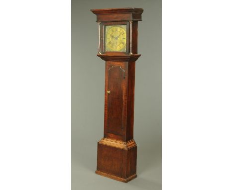 A George III oak longcase clock by E. Foster Carlisle, with thirty hour movement, long trunk door and 12 inch square dial wit