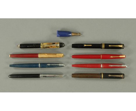 Nine vintage pens.