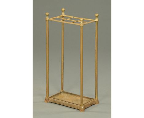 A 19th century brass stick stand, with cast iron drip tray.  Width 30 cm.    CONDITION REPORT:  Other than being extremely di