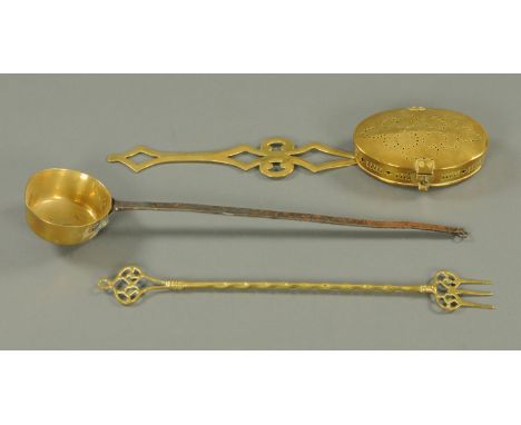 A 19th century brass chestnut roaster, ladle and toasting fork.  