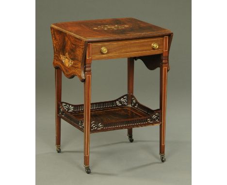 An Edwardian rosewood twin drop flap occasional table, with frieze drawer and low shelf.  Width 46 cm.    CONDITION REPORT:  