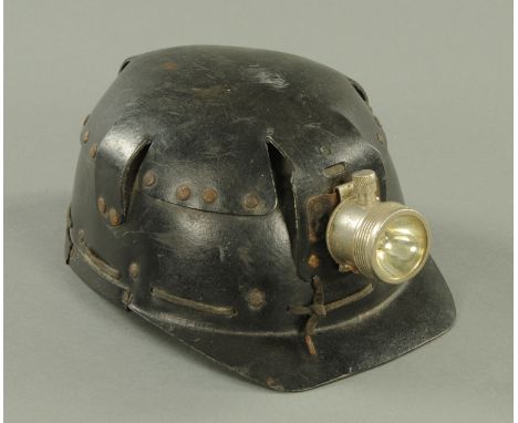 A vintage miners helmet, by Huwood "Light Type Hat".  