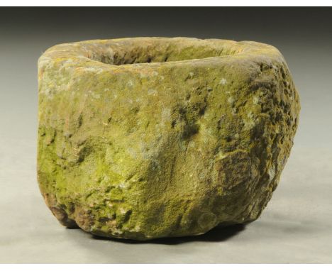 A 19th century sandstone garden trough, off circular.  Diameter +/- 50 cm.    CONDITION REPORT:  Good condition with only min