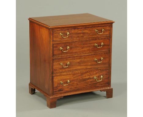 A George IV chest of drawers, with moulded edge above four graduated drawers with brass drop handles and raised on bracket fe