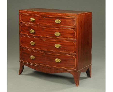 A George III mahogany bowfronted chest of drawers, with crossbanded and boxwood strung edge above four long graduated drawers