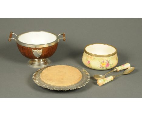 An oak fruit bowl, with silver plated mounts and ceramic liner, plated bread board and salad bowl and servers. 