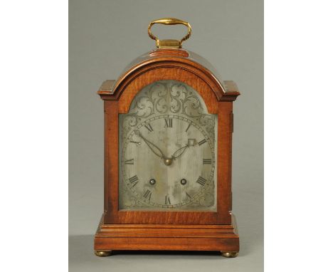 An Edwardian mahogany bracket clock, with silvered dial and two-train spring driven movement.  Height 26.5 cm (see illustrati