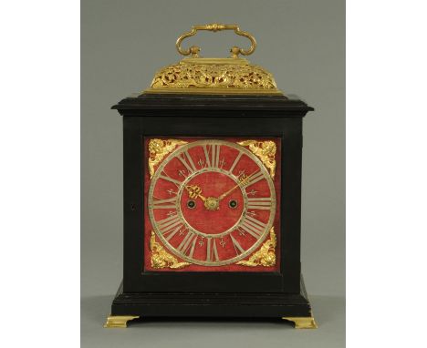 A George III and later ebonised bracket clock, with two-train fusee movement striking on a bell.  Height excluding carrying h