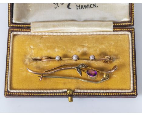 A 9ct gold brooch set with an amethyst and seed pearls together with one other