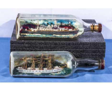 Two model ships in bottles, 28cm and 29cm