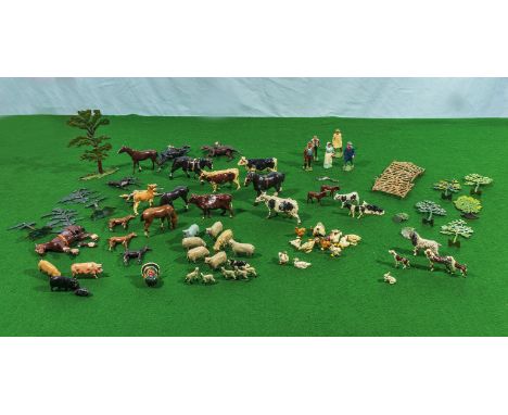 A collection of vintage Britain's lead farm animals, farm workers, trees and gates