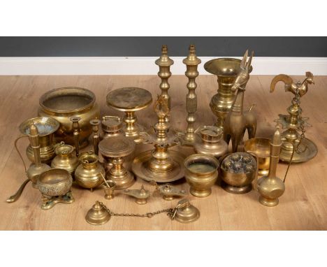 A collection of brass lamps and ornaments to include a hanging oil lamp with cockerel finial, 46cm high; a further hanging oi