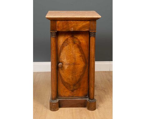 A 19th century walnut bedside cabinet with a marble top and pillar supports, 43cm wide, 40cm deep, 80cm highChip to the mable