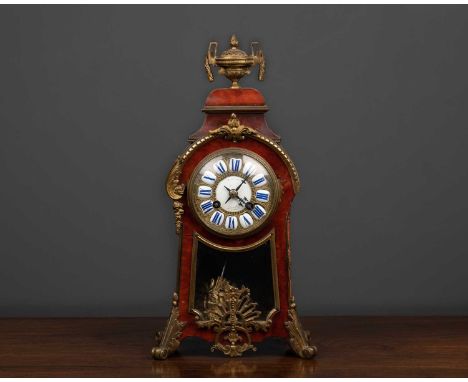 A late 19th century tortoiseshell and gilt metal mantle clock, the dial signed "R. Stewart, Glasgow", having a French movemen