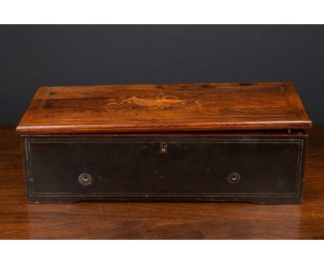 A 19th century musical box for restoration, the rosewood case with decorative inlay to the lid, the movement possibly associa