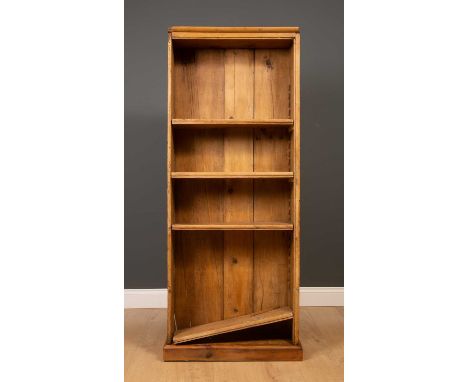 An antique pine bookocase with four adjustable shelves, 62cm wide, 154cm highSurface scratches and marks, later shelf support