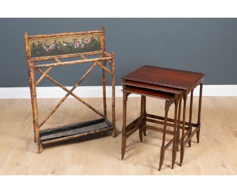 An early 20th century mahogany nest of three tables, the largest 49 cm wide x 38cm deep x 86cm high, together with a bamboo s