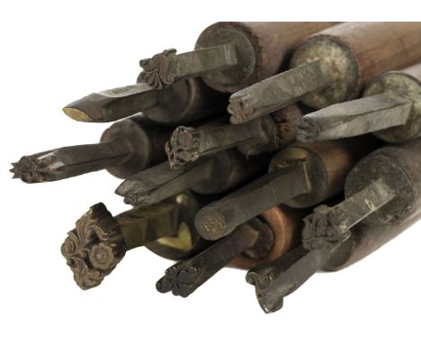 * Decorative finishing tools. 24 decorative brass finishing tools, mostly centre &amp; few corner tools mostly of traditional