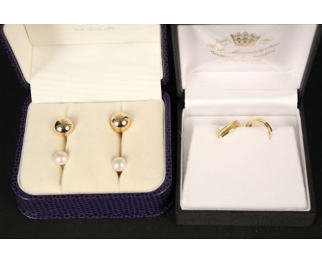 Three pairs of earrings comprising 18ct gold ball studs, a pair of 9ct gold small hoops and a pair of pearl studs