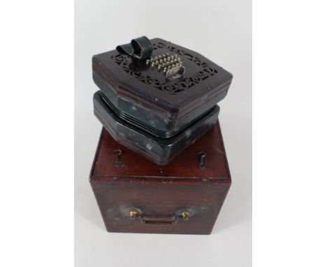 A mahogany cased accordion, bears label Roylance 184 Tot Ct Rd