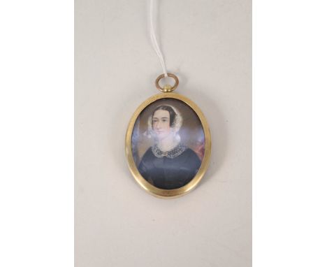 An oval miniature on ivory of head and shoulders of a lady, signed R H Culydell