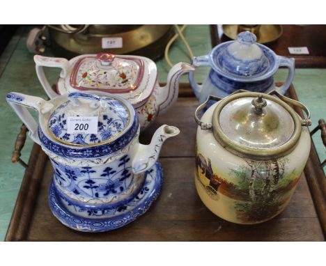 A Royal Doulton coaching scene biscuit barrel, two Victorian teapots plus a sucrier