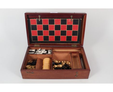 A mahogany cased compendium of games including chess