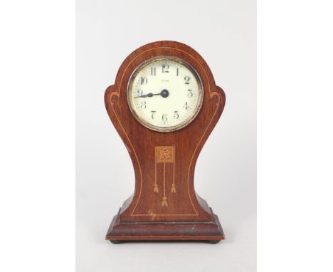 An Art Nouveau inlaid mahogany mantel clock