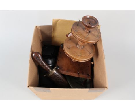 A cotton winder, camera lenses and sundries