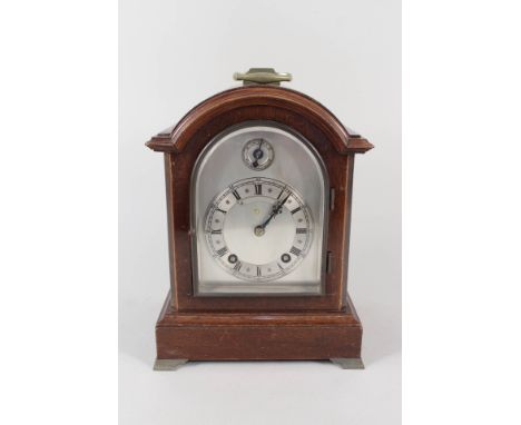 A walnut striking bracket clock, movement marked W &amp; H