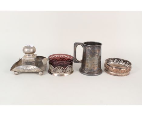 A hammered silver plate inkwell, two coasters plus a glass bottom tankard