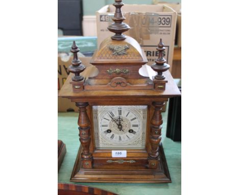 A Junghans striking mantel clock with applied gilt metal decoration