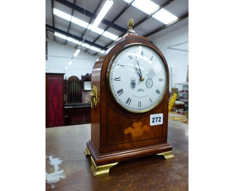 A COMITTI OF LONDON INLAID MANTLE CLOCK WITH BRASS FEET. 