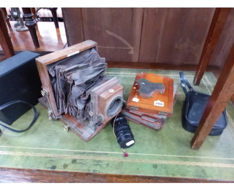 A LANCASTER MAHOGANY PLATE CAMERA, A LATER CAMERA LENS, AND A PAIR OF SUPER ZENITH BINOCULARS. 