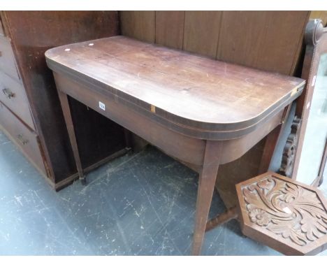 A GEORGIAN MAHOGANY AND LINE INLAID FOLD OVER CARD TABLE ON SQUARE TAPER LEGS.