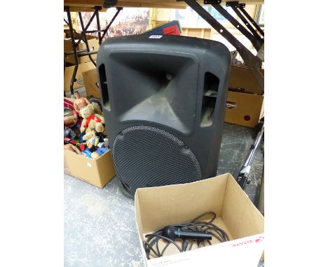 A STUDIO MASTER SPEAKER AND AMPLIFIER, DRIVE 12A, TOGETHER WITH  A STAGG MICROPHONE, CABLE AND STAND, IN GOOD WORKING ORDER. 